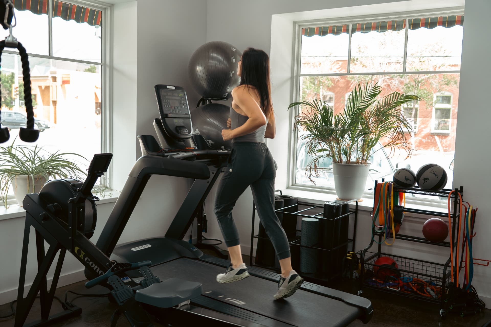 Member running on the treadmill in the cardio and conditioning area at API in Hailey, ID