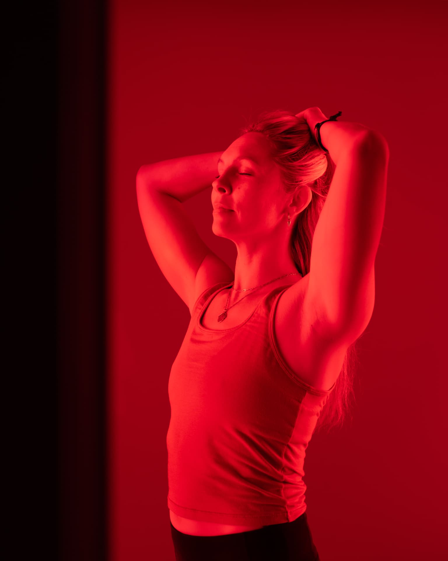 Member using red light therapy at API's Recovery Zone in Hailey, ID
