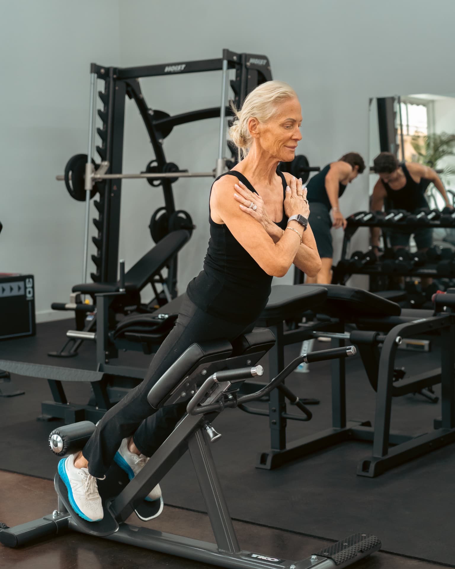 Member using a back extension bench during open gym at API in Hailey, ID